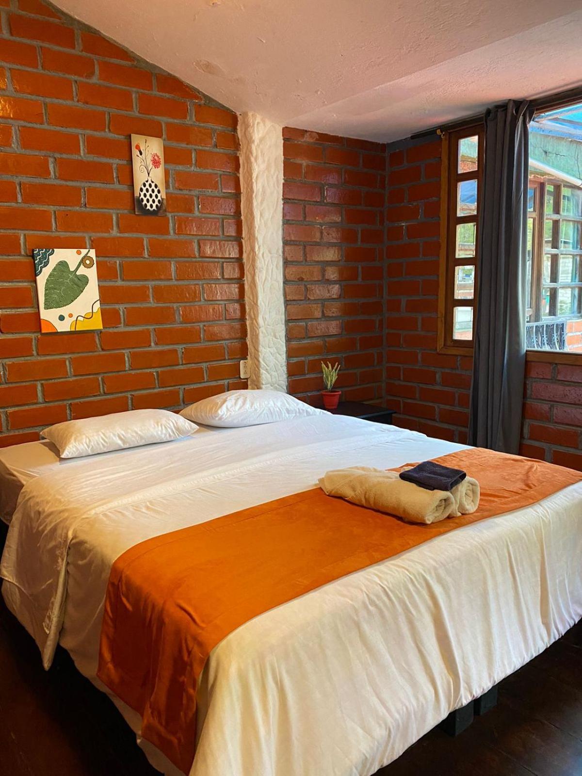 Garden House Hostal Baños Екстериор снимка