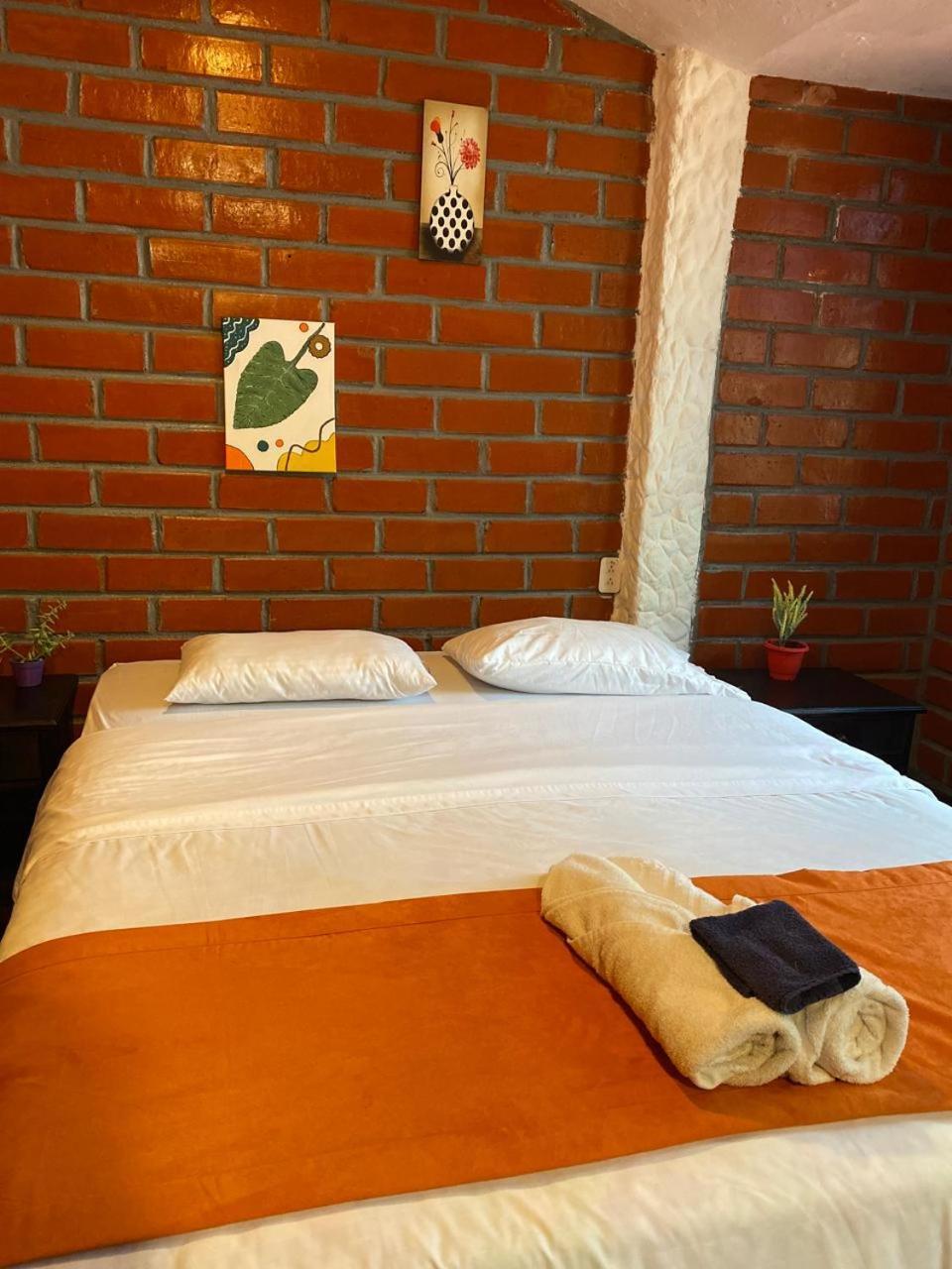 Garden House Hostal Baños Екстериор снимка